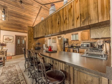 Tucked among mature pines and just a short walk to Monte Verde on Angel Fire Resort Country Club in New Mexico - for sale on GolfHomes.com, golf home, golf lot
