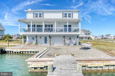 ABSOLUTE STUNNER!! Waterfront living on the Chincoteague Bay on Captains Cove Golf and Yacht Club in Virginia - for sale on GolfHomes.com, golf home, golf lot