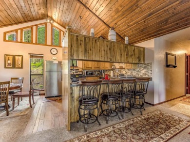 Tucked among mature pines and just a short walk to Monte Verde on Angel Fire Resort Country Club in New Mexico - for sale on GolfHomes.com, golf home, golf lot