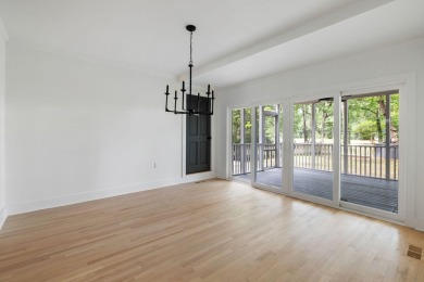 This beautifully updated charmer boasts dual primary suites -- on Snee Farm Country Club in South Carolina - for sale on GolfHomes.com, golf home, golf lot