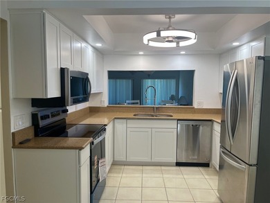 Desirable first floor end unit condo with 2 bedrooms and 2 on Seven Lakes Golf and Tennis Community in Florida - for sale on GolfHomes.com, golf home, golf lot