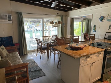 Welcome to The Keys Escape! This fully renovated two bedroom/two on Key Colony Beach Golf Course in Florida - for sale on GolfHomes.com, golf home, golf lot