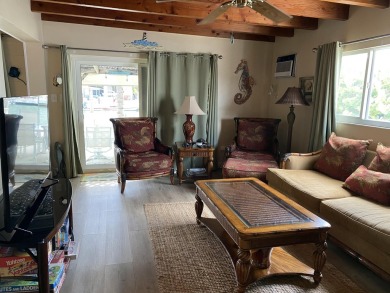 Welcome to The Keys Escape! This fully renovated two bedroom/two on Key Colony Beach Golf Course in Florida - for sale on GolfHomes.com, golf home, golf lot