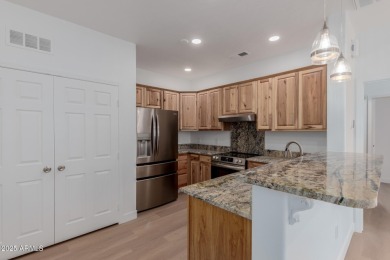 Discover resort-style living in this beautifully updated 1 bed on Wigwam Golf  Resort Litchfield Park  in Arizona - for sale on GolfHomes.com, golf home, golf lot