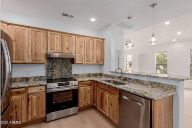 Discover resort-style living in this beautifully updated 1 bed on Wigwam Golf  Resort Litchfield Park  in Arizona - for sale on GolfHomes.com, golf home, golf lot