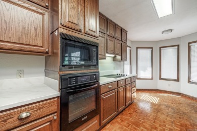 Spacious home looking for new family. Living room with vaulted on DeSoto Golf Course in Arkansas - for sale on GolfHomes.com, golf home, golf lot