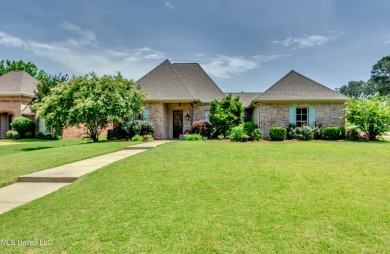 Welcome to this beautifully designed 4-bedroom, 2.5-bath home on Lake Caroline Golf Club in Mississippi - for sale on GolfHomes.com, golf home, golf lot