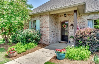 Welcome to this beautifully designed 4-bedroom, 2.5-bath home on Lake Caroline Golf Club in Mississippi - for sale on GolfHomes.com, golf home, golf lot