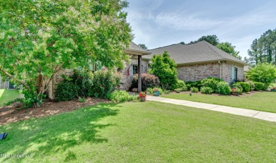 Welcome to this beautifully designed 4-bedroom, 2.5-bath home on Lake Caroline Golf Club in Mississippi - for sale on GolfHomes.com, golf home, golf lot