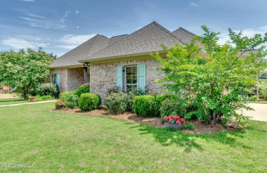 Welcome to this beautifully designed 4-bedroom, 2.5-bath home on Lake Caroline Golf Club in Mississippi - for sale on GolfHomes.com, golf home, golf lot