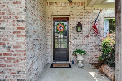 Welcome to this beautifully designed 4-bedroom, 2.5-bath home on Lake Caroline Golf Club in Mississippi - for sale on GolfHomes.com, golf home, golf lot