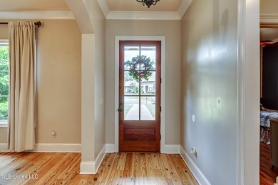 Welcome to this beautifully designed 4-bedroom, 2.5-bath home on Lake Caroline Golf Club in Mississippi - for sale on GolfHomes.com, golf home, golf lot