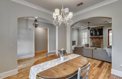 Welcome to this beautifully designed 4-bedroom, 2.5-bath home on Lake Caroline Golf Club in Mississippi - for sale on GolfHomes.com, golf home, golf lot