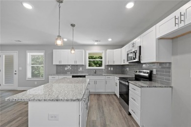 Discover this stunning 3-bedroom, 2.5-bath home with a spacious on Turtle Cove Golf Course in Georgia - for sale on GolfHomes.com, golf home, golf lot