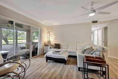 Very Clean freshly painted unit with new modern flooring on Polo Trace Golf Club in Florida - for sale on GolfHomes.com, golf home, golf lot