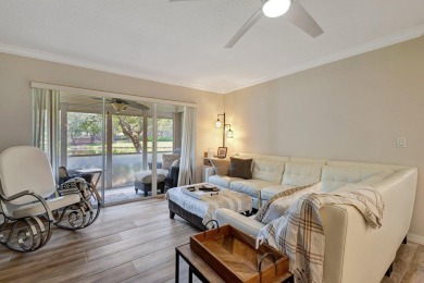 Very Clean freshly painted unit with new modern flooring on Polo Trace Golf Club in Florida - for sale on GolfHomes.com, golf home, golf lot