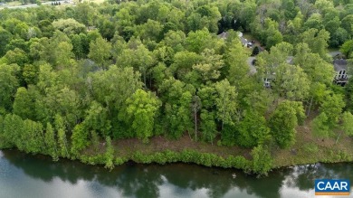 This lot is lake front on Tuckahoe golf course #20, and features on Wintergreen Golf Course and Resort in Virginia - for sale on GolfHomes.com, golf home, golf lot