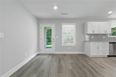 Discover this stunning 3-bedroom, 2.5-bath home with a spacious on Turtle Cove Golf Course in Georgia - for sale on GolfHomes.com, golf home, golf lot