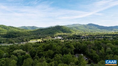 This lot is lake front on Tuckahoe golf course #20, and features on Wintergreen Golf Course and Resort in Virginia - for sale on GolfHomes.com, golf home, golf lot