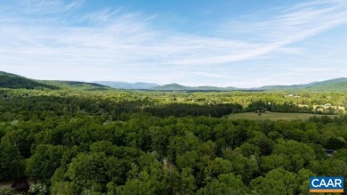 This lot is lake front on Tuckahoe golf course #20, and features on Wintergreen Golf Course and Resort in Virginia - for sale on GolfHomes.com, golf home, golf lot