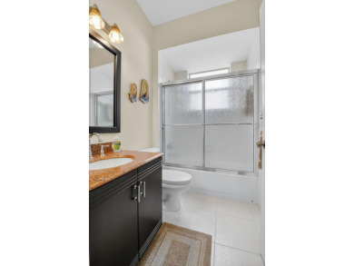 Updated, Beautiful lake view first floor  Villa/coach home on Westchester Golf and Country Club in Florida - for sale on GolfHomes.com, golf home, golf lot