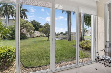 Updated, Beautiful lake view first floor  Villa/coach home on Westchester Golf and Country Club in Florida - for sale on GolfHomes.com, golf home, golf lot