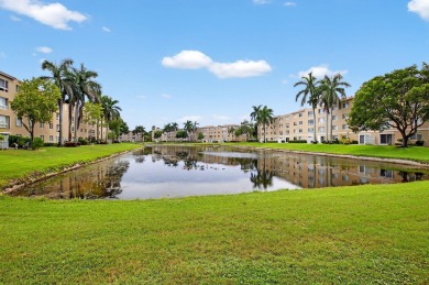 Updated, Beautiful lake view first floor  Villa/coach home on Westchester Golf and Country Club in Florida - for sale on GolfHomes.com, golf home, golf lot