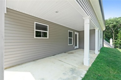 Discover this stunning 3-bedroom, 2.5-bath home with a spacious on Turtle Cove Golf Course in Georgia - for sale on GolfHomes.com, golf home, golf lot