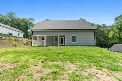 Discover this stunning 3-bedroom, 2.5-bath home with a spacious on Turtle Cove Golf Course in Georgia - for sale on GolfHomes.com, golf home, golf lot