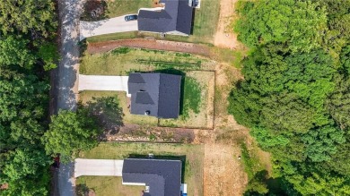 Discover this stunning 3-bedroom, 2.5-bath home with a spacious on Turtle Cove Golf Course in Georgia - for sale on GolfHomes.com, golf home, golf lot