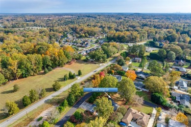 Just a short walk from The Gaston Country Club, you will find on Gaston Country Club in North Carolina - for sale on GolfHomes.com, golf home, golf lot