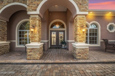 Welcome to 568 Luna Bella Lane, a luxurious lakefront estate on Venetian Bay Golf Course in Florida - for sale on GolfHomes.com, golf home, golf lot
