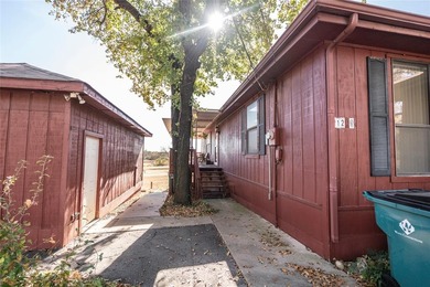 Beautiful golf-course home in the gated community of Nocona on Nocona Hills Golf Course in Texas - for sale on GolfHomes.com, golf home, golf lot