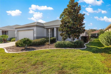 Welcome to this better-than-new Aster!  The concrete curbed on Candler Hills Golf and Country Club in Florida - for sale on GolfHomes.com, golf home, golf lot