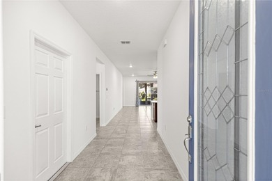 Welcome to this better-than-new Aster!  The concrete curbed on Candler Hills Golf and Country Club in Florida - for sale on GolfHomes.com, golf home, golf lot