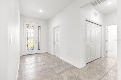 Welcome to this better-than-new Aster!  The concrete curbed on Candler Hills Golf and Country Club in Florida - for sale on GolfHomes.com, golf home, golf lot