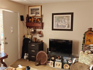 ATTENTION INVESTORS: open and bright 2 bedroom, 2 full bath on Lehigh Resort Club in Florida - for sale on GolfHomes.com, golf home, golf lot