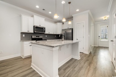 Welcome to this stunning 4-bedroom, 2.5-bathroom townhome on Barefoot Resort and Golf Club  in South Carolina - for sale on GolfHomes.com, golf home, golf lot