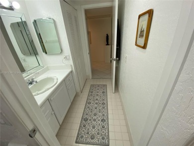 GATED COMMUNITY! ONE BED ONE BATH CONDO WITH LAKE VIEW FROM BACK on Wynmoor Golf Course in Florida - for sale on GolfHomes.com, golf home, golf lot