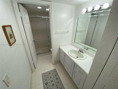 GATED COMMUNITY! ONE BED ONE BATH CONDO WITH LAKE VIEW FROM BACK on Wynmoor Golf Course in Florida - for sale on GolfHomes.com, golf home, golf lot