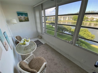 GATED COMMUNITY! ONE BED ONE BATH CONDO WITH LAKE VIEW FROM BACK on Wynmoor Golf Course in Florida - for sale on GolfHomes.com, golf home, golf lot