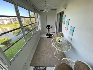 GATED COMMUNITY! ONE BED ONE BATH CONDO WITH LAKE VIEW FROM BACK on Wynmoor Golf Course in Florida - for sale on GolfHomes.com, golf home, golf lot