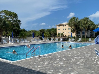 GATED COMMUNITY! ONE BED ONE BATH CONDO WITH LAKE VIEW FROM BACK on Wynmoor Golf Course in Florida - for sale on GolfHomes.com, golf home, golf lot