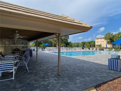 GATED COMMUNITY! ONE BED ONE BATH CONDO WITH LAKE VIEW FROM BACK on Wynmoor Golf Course in Florida - for sale on GolfHomes.com, golf home, golf lot