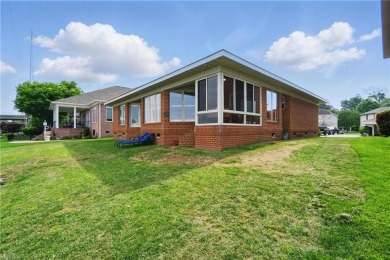 Welcome to this exquisite, custom-built, brick ranch located in on The Woodlands Golf Course in Virginia - for sale on GolfHomes.com, golf home, golf lot