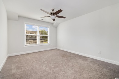 Welcome to this stunning 4-bedroom, 2.5-bathroom townhome on Barefoot Resort and Golf Club  in South Carolina - for sale on GolfHomes.com, golf home, golf lot
