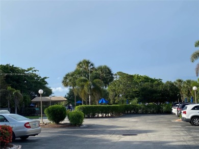 GATED COMMUNITY! ONE BED ONE BATH CONDO WITH LAKE VIEW FROM BACK on Wynmoor Golf Course in Florida - for sale on GolfHomes.com, golf home, golf lot