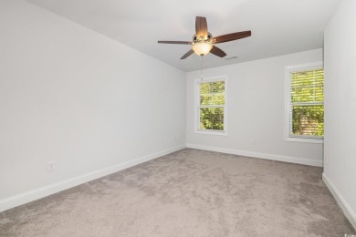 Welcome to this stunning 4-bedroom, 2.5-bathroom townhome on Barefoot Resort and Golf Club  in South Carolina - for sale on GolfHomes.com, golf home, golf lot