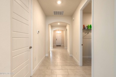 Almost New-But Even Better! Modern Elegance in Halifax on Halifax Plantation Golf Club in Florida - for sale on GolfHomes.com, golf home, golf lot