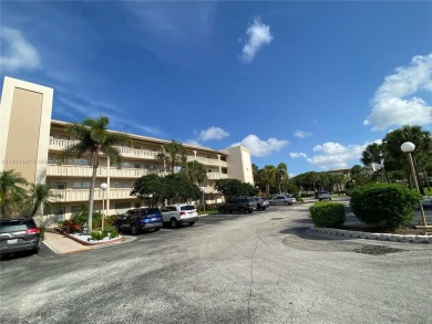 GATED COMMUNITY! ONE BED ONE BATH CONDO WITH LAKE VIEW FROM BACK on Wynmoor Golf Course in Florida - for sale on GolfHomes.com, golf home, golf lot